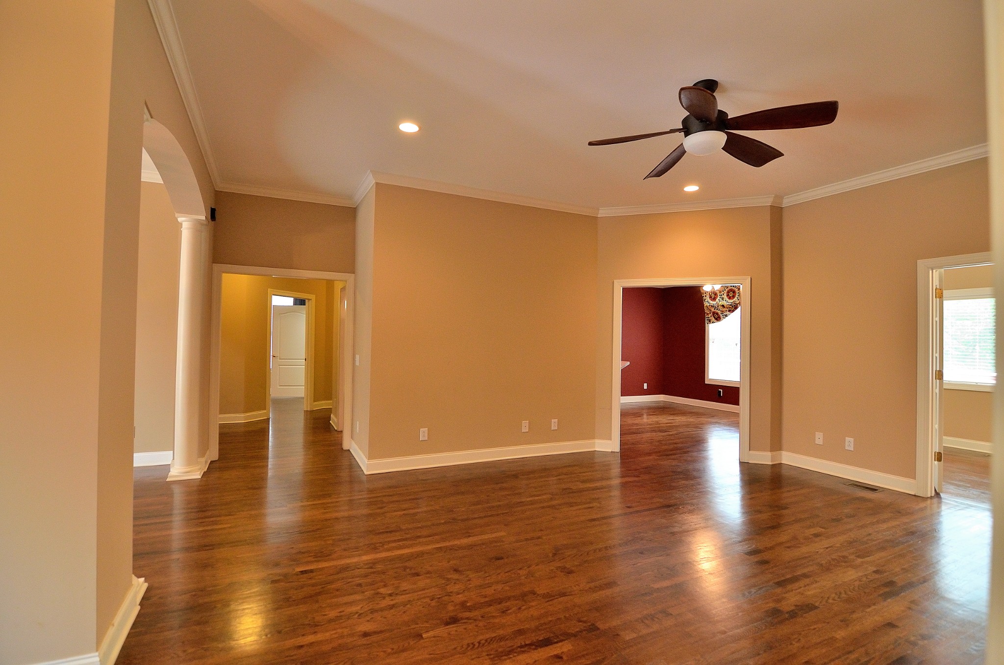 2600 Derby Run Road Springfield, TN 37172 - Photo 14 of 57 a view of a livingroom with a ceiling fan wooden floor and window