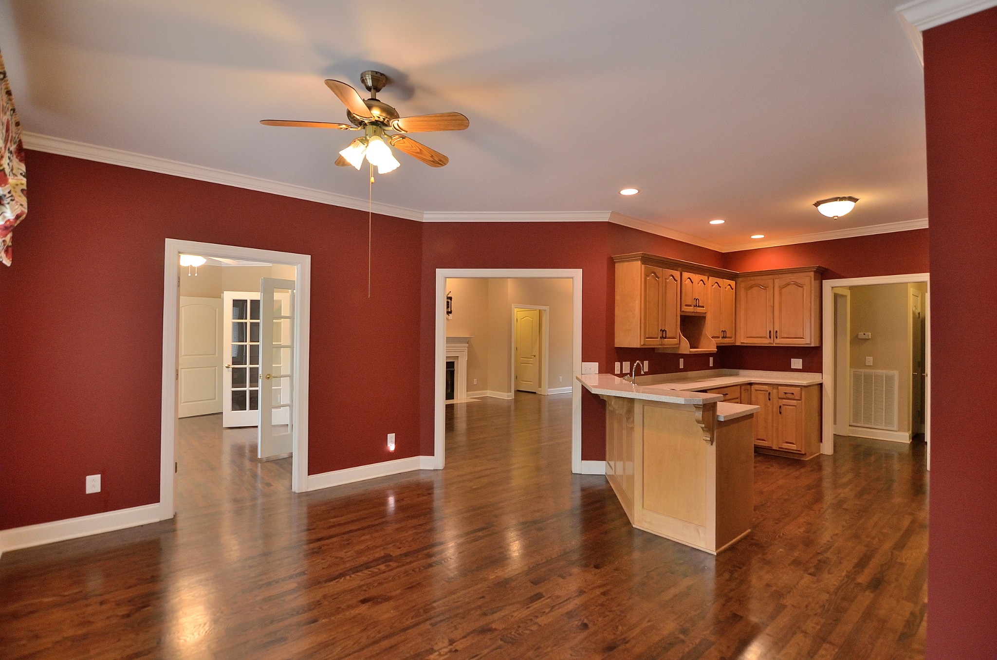 2600 Derby Run Road Springfield, TN 37172 - Photo 19 of 57 a open kitchen with stainless steel appliances granite countertop a refrigerator a stove top oven a sink and dishwasher with wooden floor