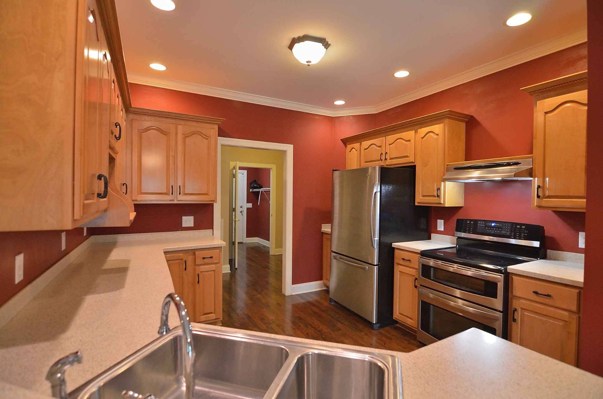 2600 Derby Run Road Springfield, TN 37172 - Photo 23 of 57 a kitchen with stainless steel appliances granite countertop a refrigerator and a stove top oven