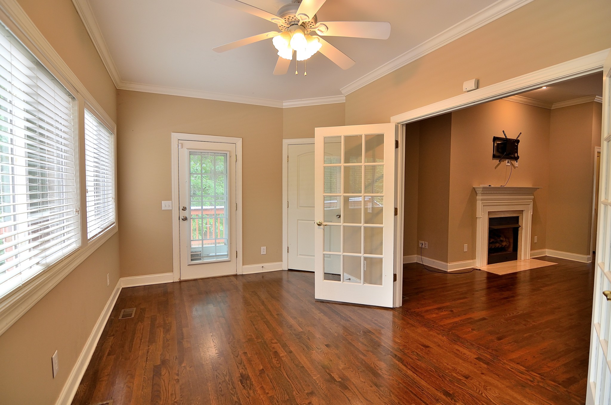 2600 Derby Run Road Springfield, TN 37172 - Photo 30 of 57 a view of an empty room with wooden floor and a window