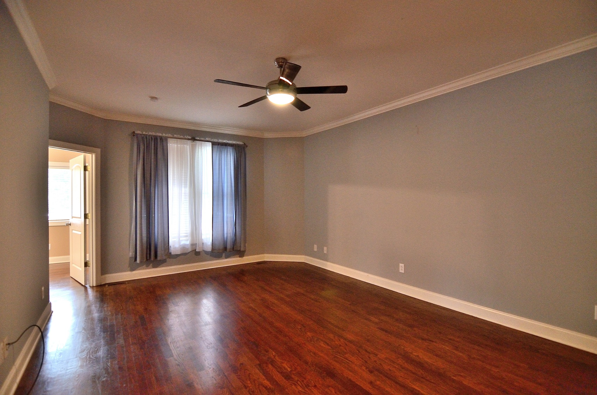 2600 Derby Run Road Springfield, TN 37172 - Photo 34 of 57 wooden floor in an empty room with a window