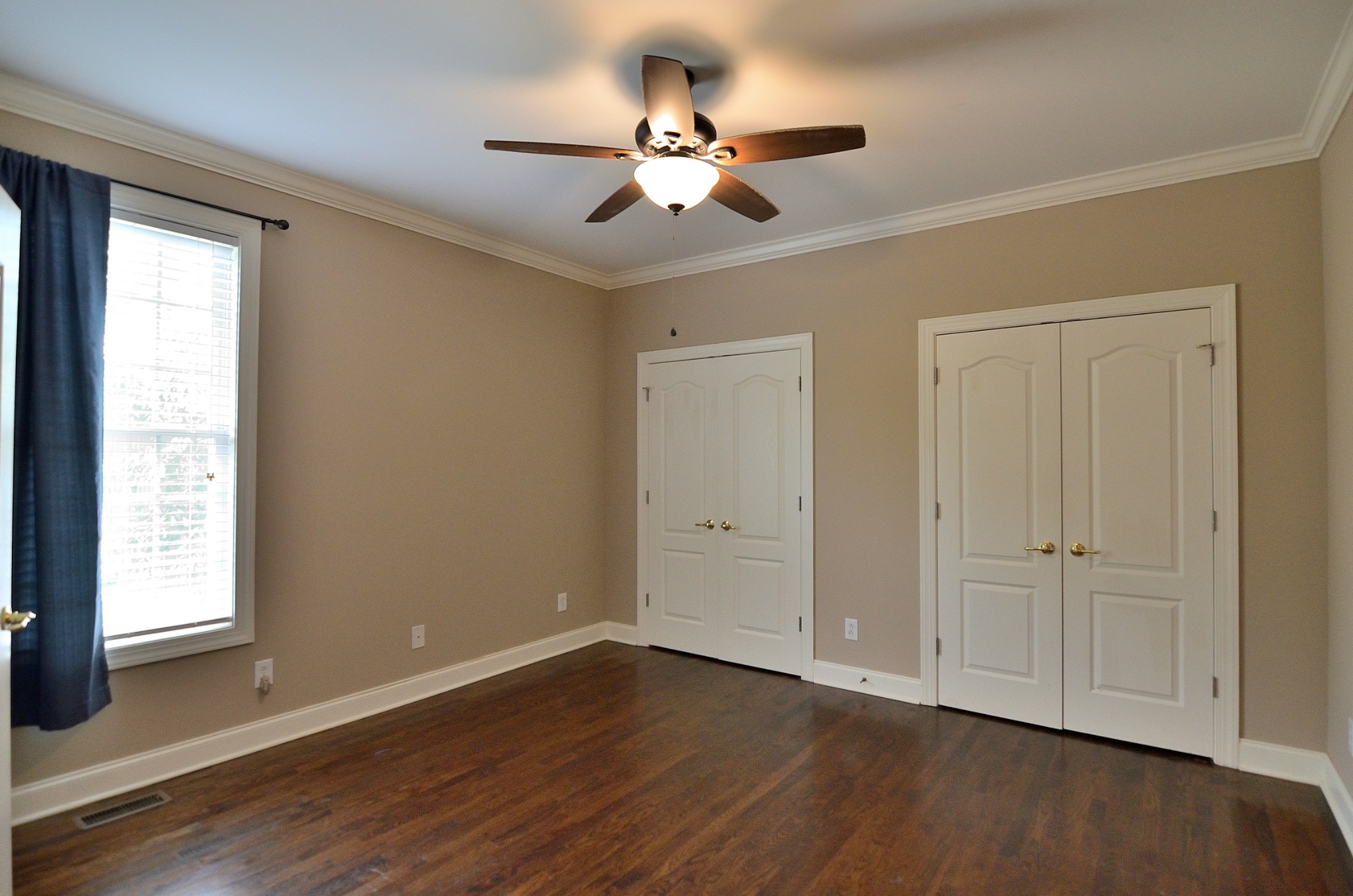 2600 Derby Run Road Springfield, TN 37172 - Photo 45 of 57 a view of an empty room with wooden floor and a window