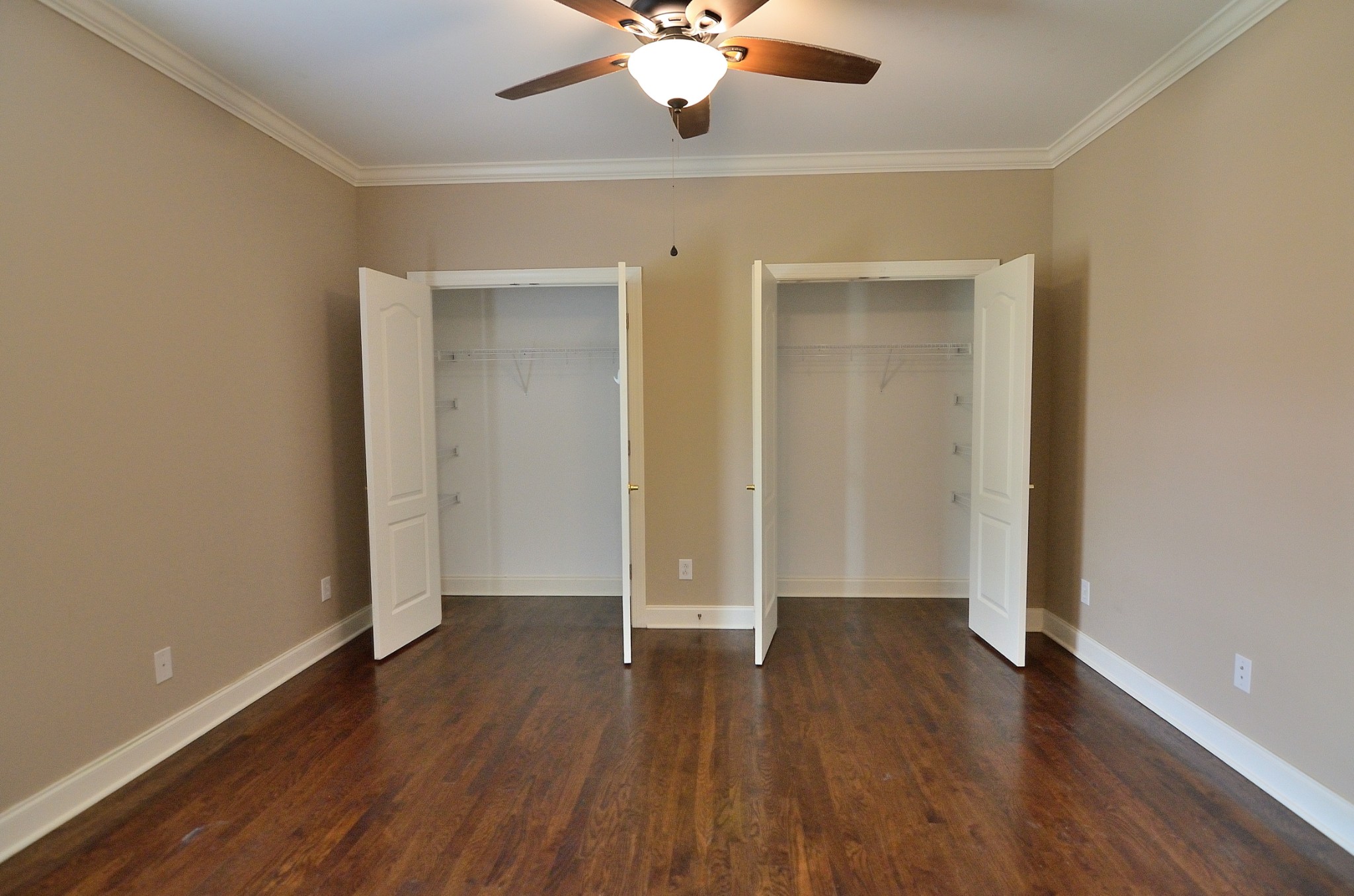 2600 Derby Run Road Springfield, TN 37172 - Photo 47 of 57 an empty room with wooden floor and a ceiling fan
