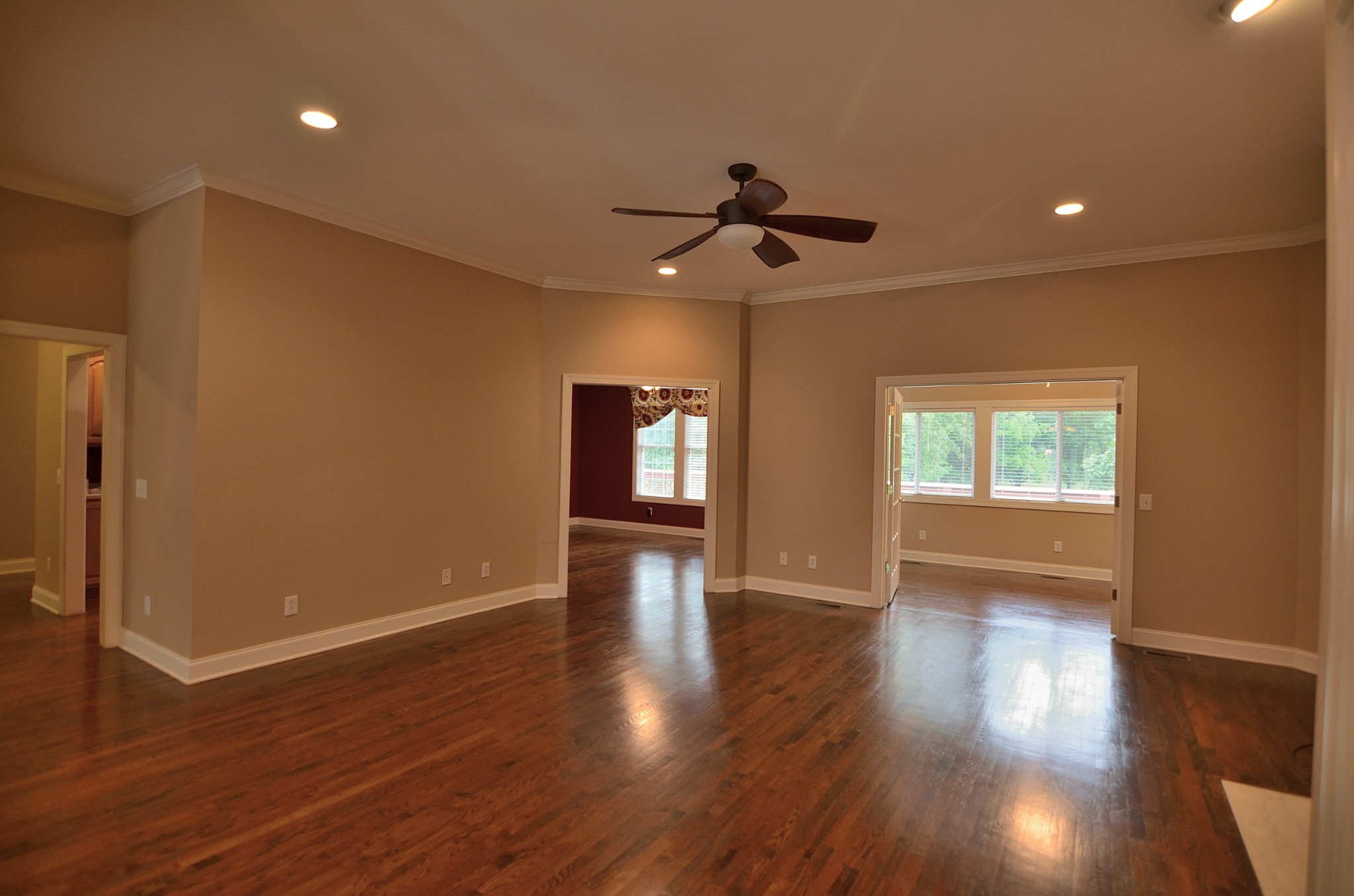 2600 Derby Run Road Springfield, TN 37172 - Photo 5 of 57 a view of an empty room with wooden floor and a window