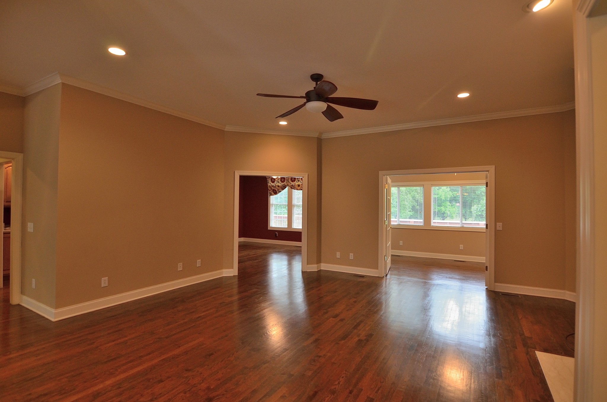 2600 Derby Run Road Springfield, TN 37172 - Photo 7 of 57 a view of an empty room with wooden floor and a window