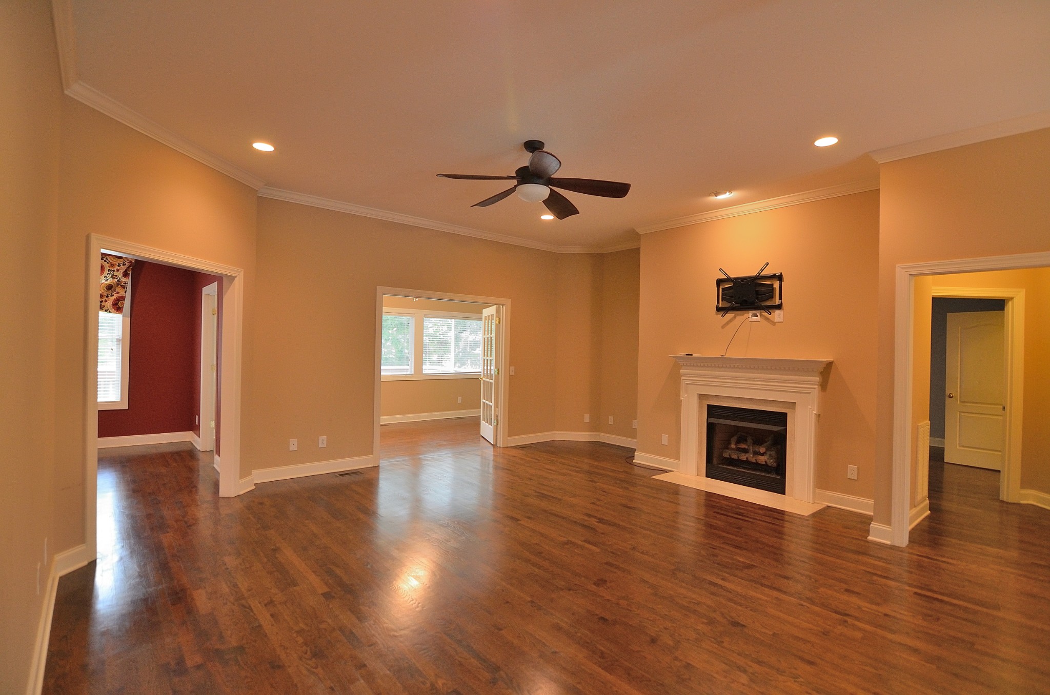 2600 Derby Run Road Springfield, TN 37172 - Photo 8 of 57 a view of empty room with wooden floor and fireplace