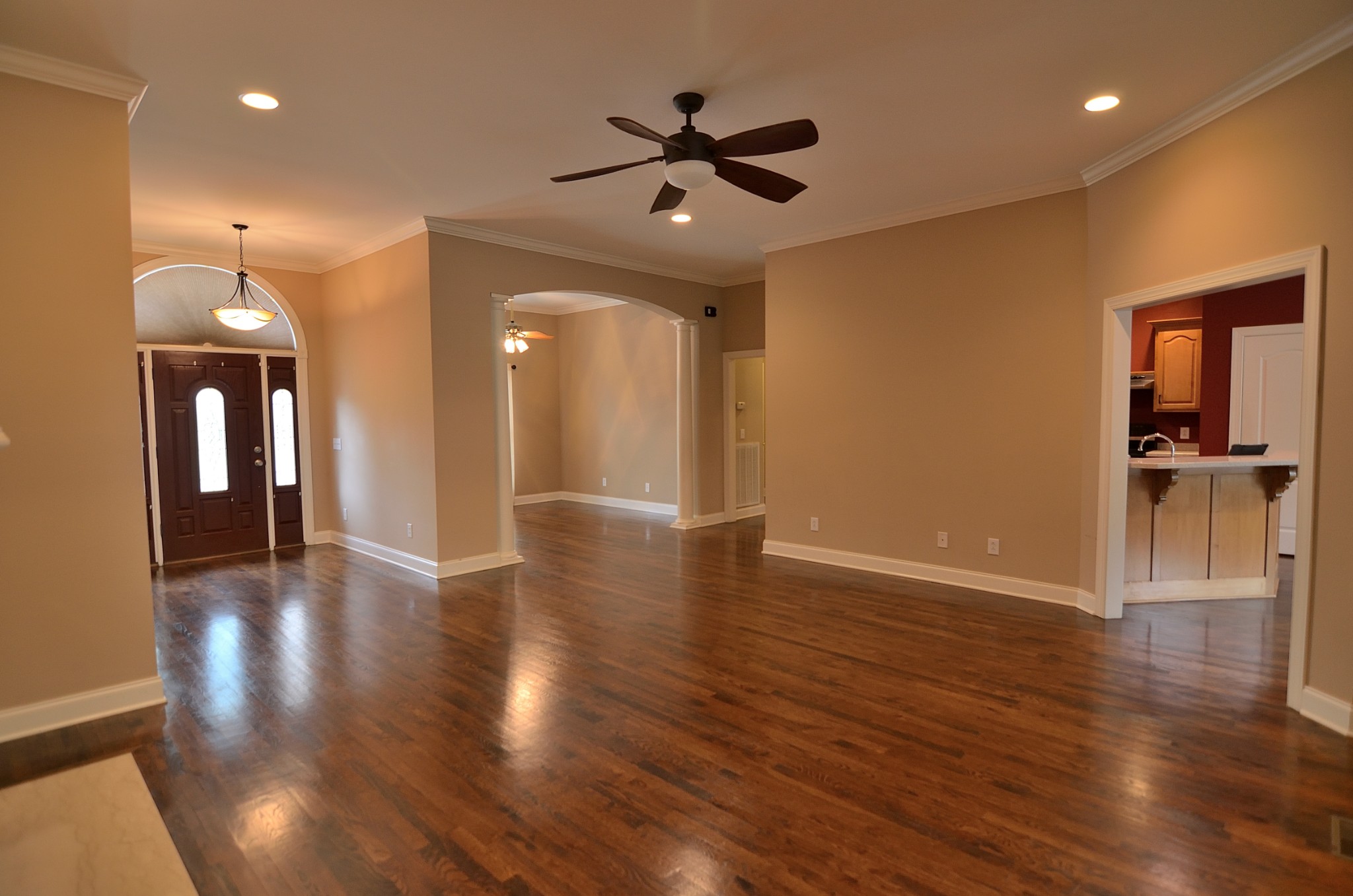 2600 Derby Run Road Springfield, TN 37172 - Photo 9 of 57 a view of a livingroom with a hardwood floor and a ceiling fan