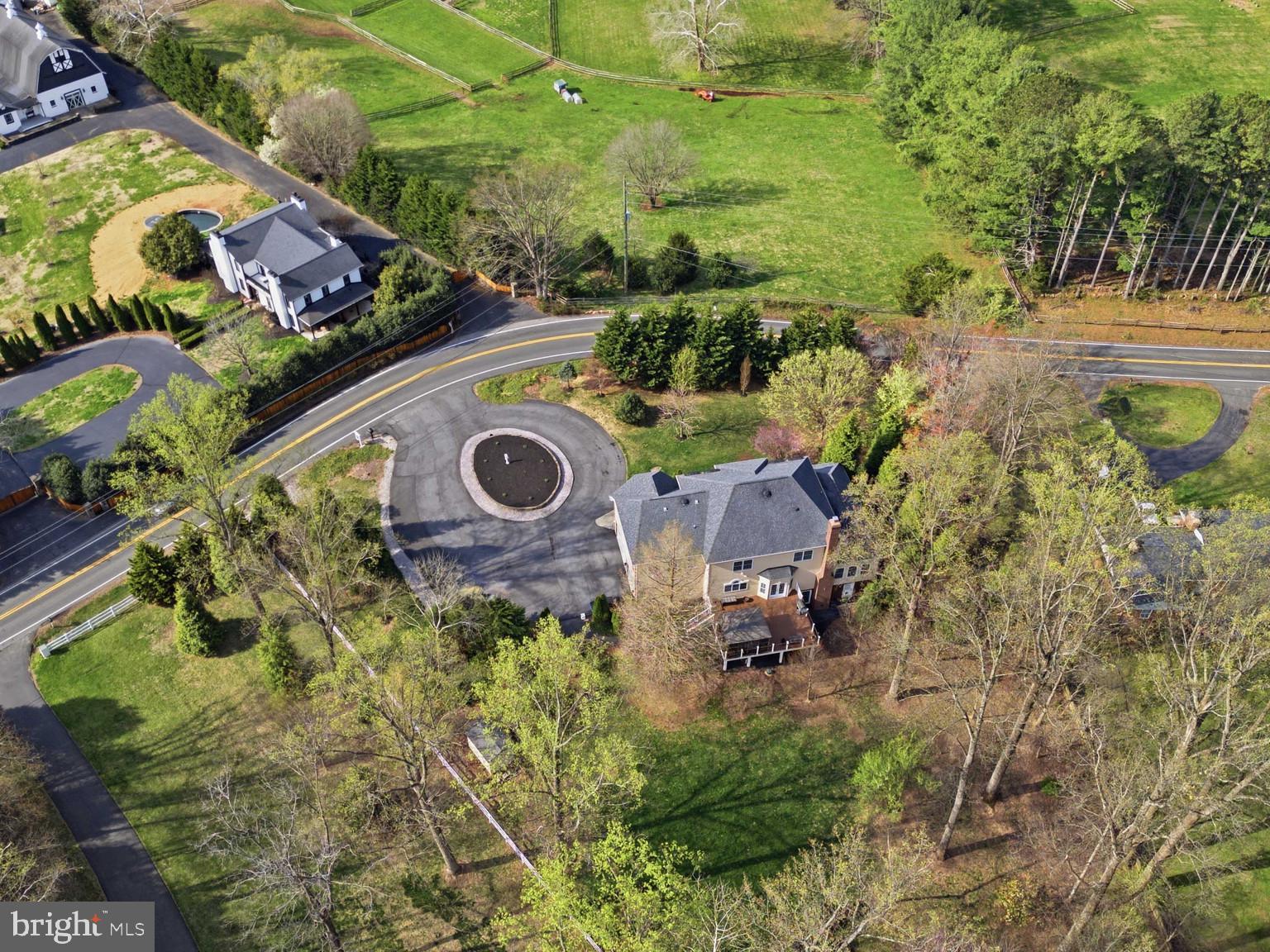 7501 Clifton Road Clifton, VA 20124 - Photo 61 of 93 an aerial view of residential house with outdoor space and parking