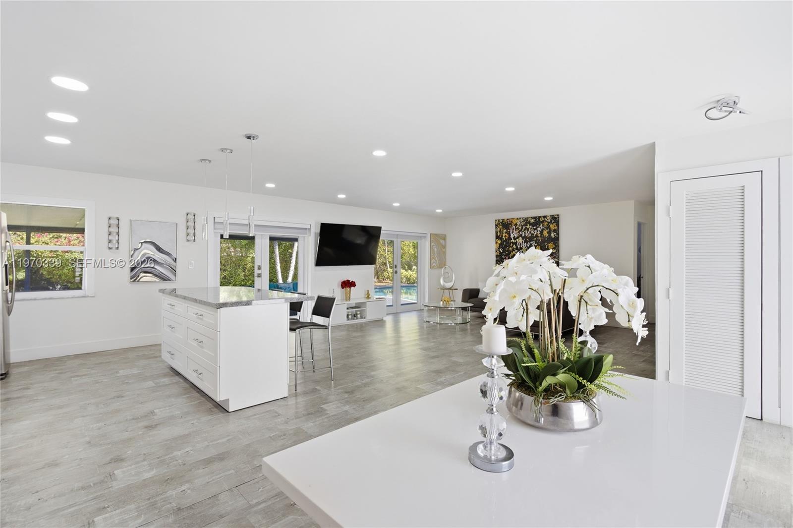12845 Southwest 72nd Terrace Miami, FL 33183 - Photo 14 of 33 a living room with furniture potted plant and a table