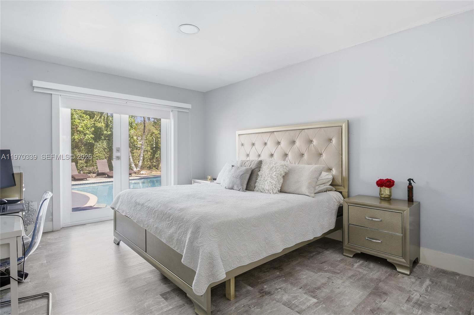 12845 Southwest 72nd Terrace Miami, FL 33183 - Photo 18 of 33 a bedroom with a bed and a window