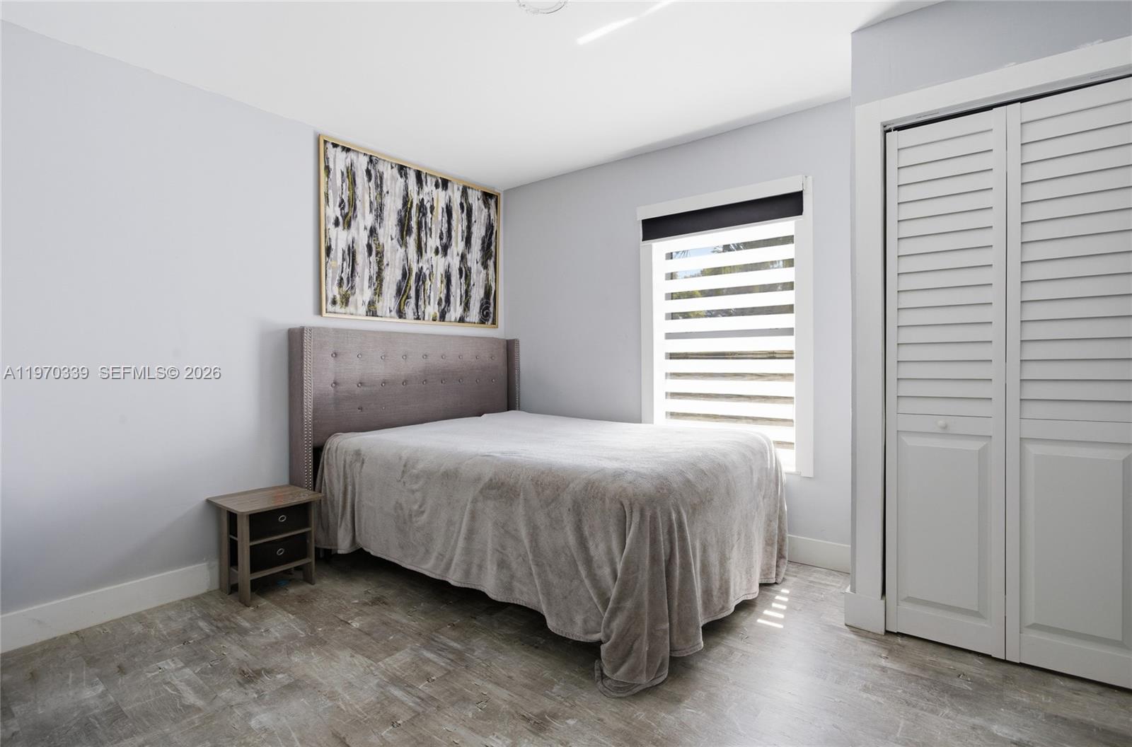 12845 Southwest 72nd Terrace Miami, FL 33183 - Photo 23 of 33 a bedroom with a bed and a window