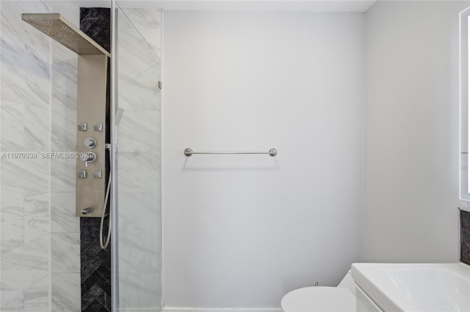 12845 Southwest 72nd Terrace Miami, FL 33183 - Photo 24 of 33 a bathroom with a toilet and a shower