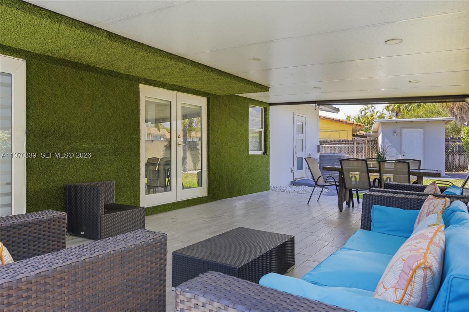 12845 Southwest 72nd Terrace Miami, FL 33183 - Photo 5 of 33 a living room with furniture and a large window