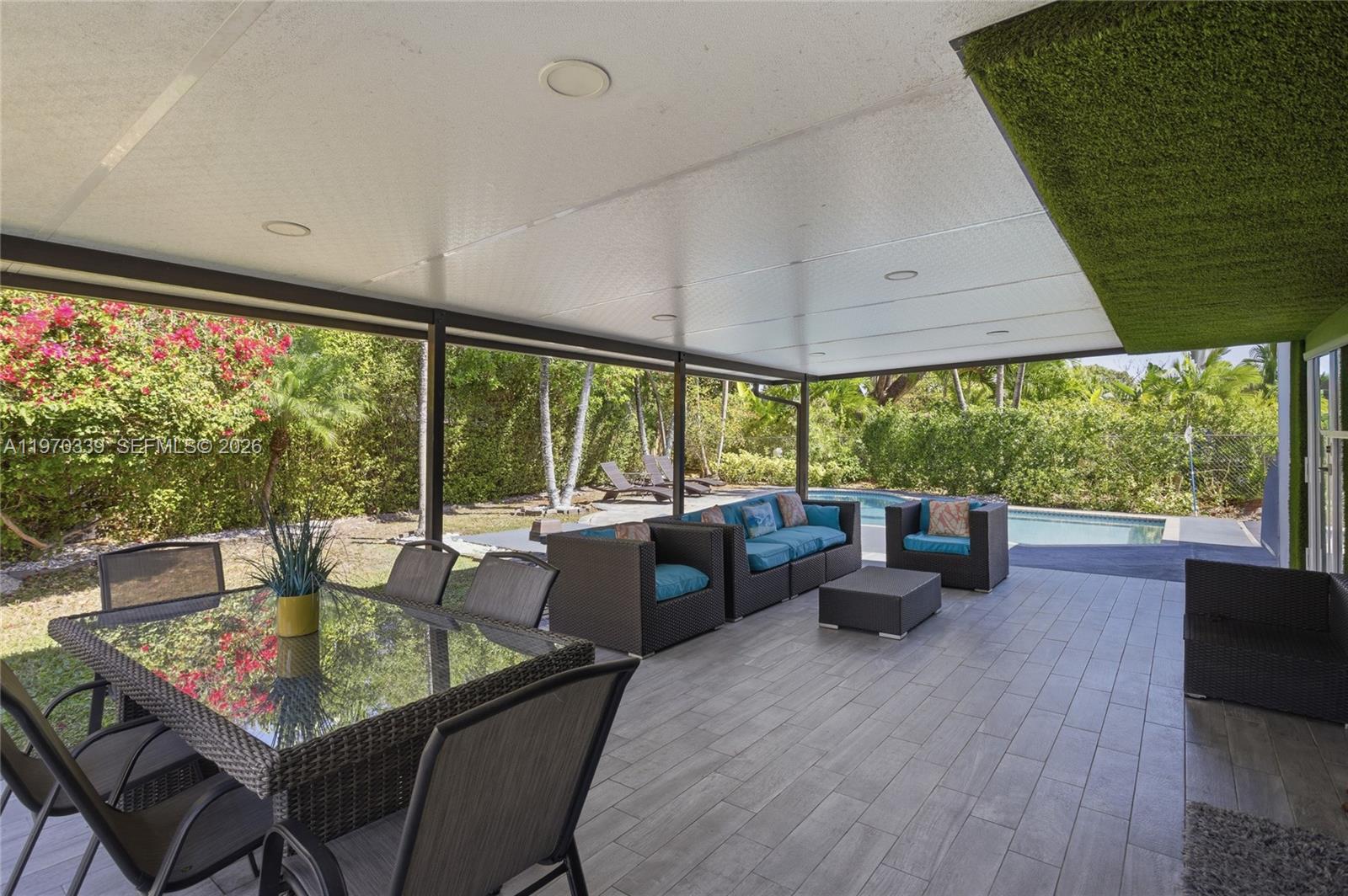 12845 Southwest 72nd Terrace Miami, FL 33183 - Photo 6 of 33 a outdoor dining space with furniture and garden view