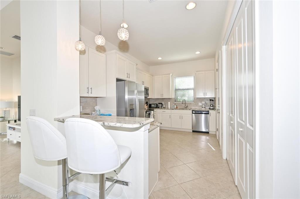 1326 Kendari Terrace Naples, FL 34113 - Photo 7 of 44
