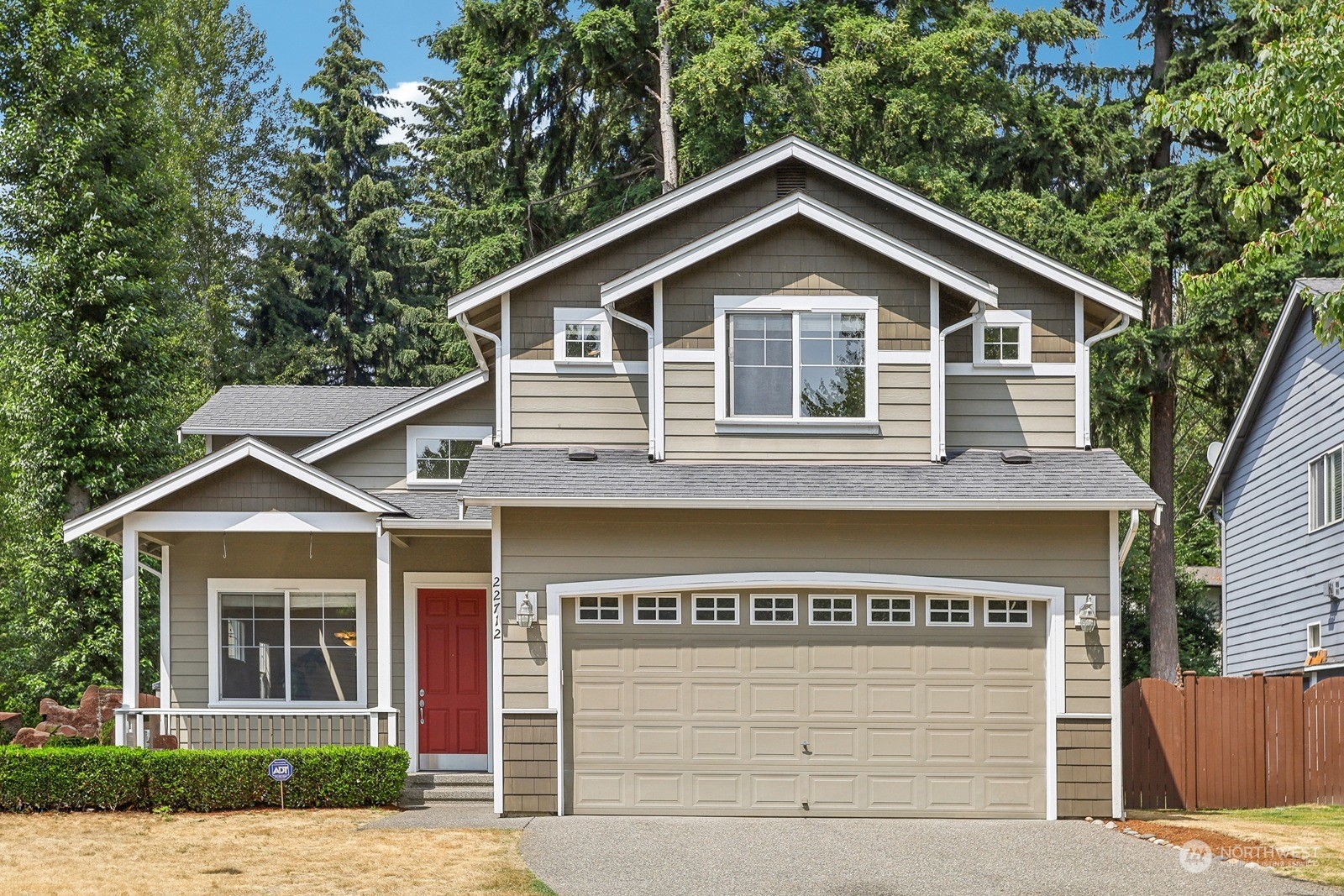 22712 30th Court Southeast Bothell, WA 98021 - Photo 1 of 38 a front view of a house with a garage
