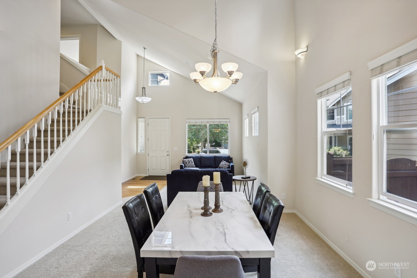22712 30th Court Southeast Bothell, WA 98021 - Photo 11 of 38 a view of a dining room with furniture window and wooden floor