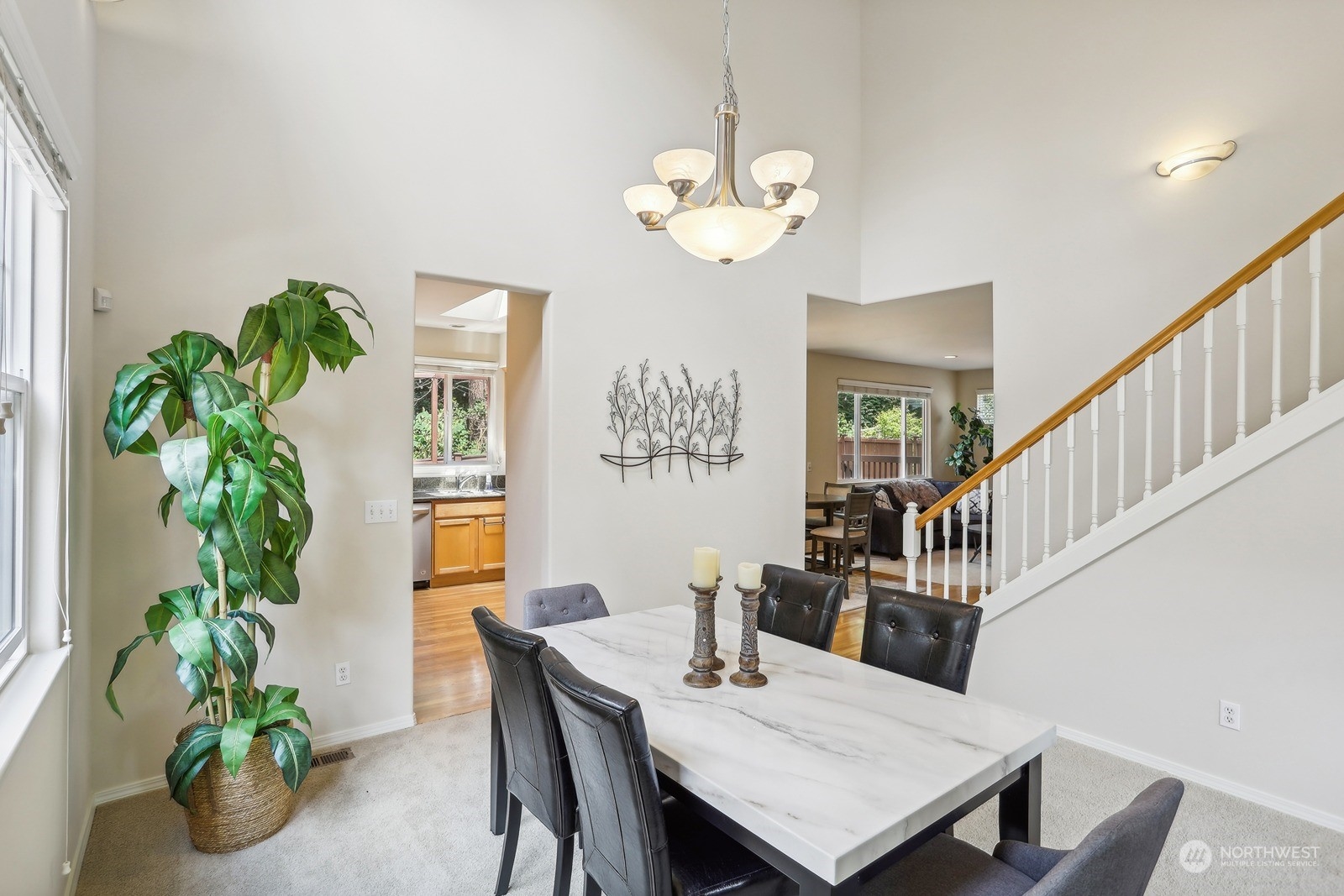 22712 30th Court Southeast Bothell, WA 98021 - Photo 13 of 38 a view of a dining room with furniture and wooden floor