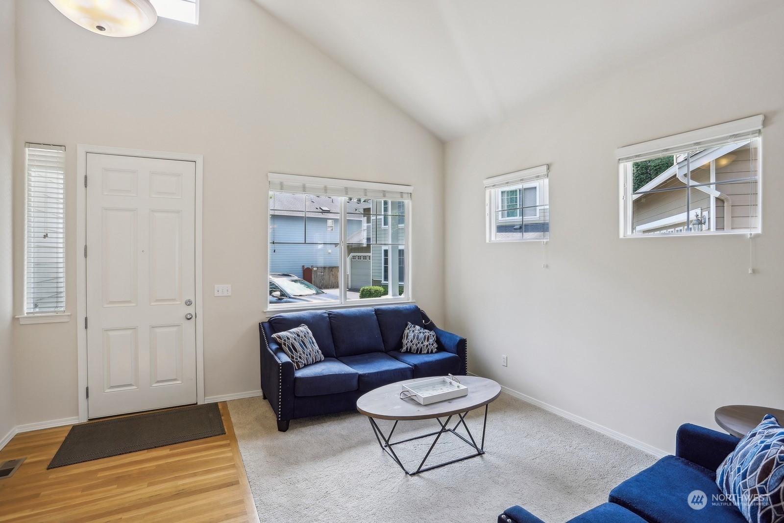 22712 30th Court Southeast Bothell, WA 98021 - Photo 15 of 38 a living room with furniture and a rug