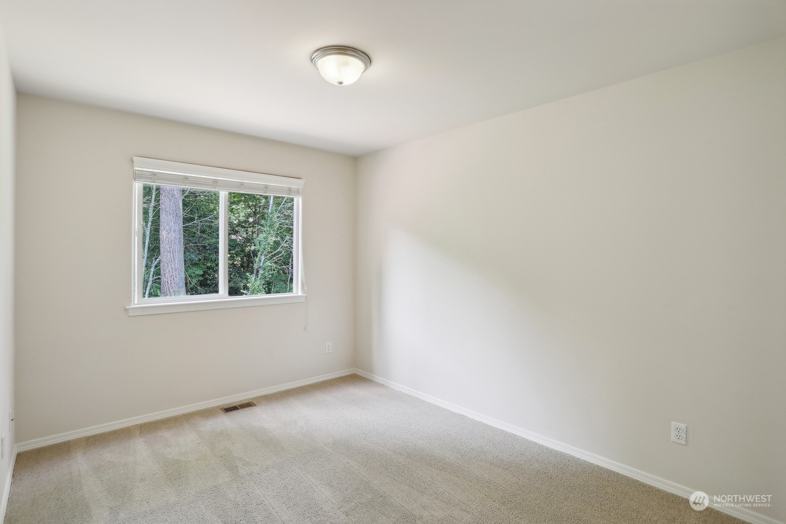 22712 30th Court Southeast Bothell, WA 98021 - Photo 30 of 38 an empty room with a window