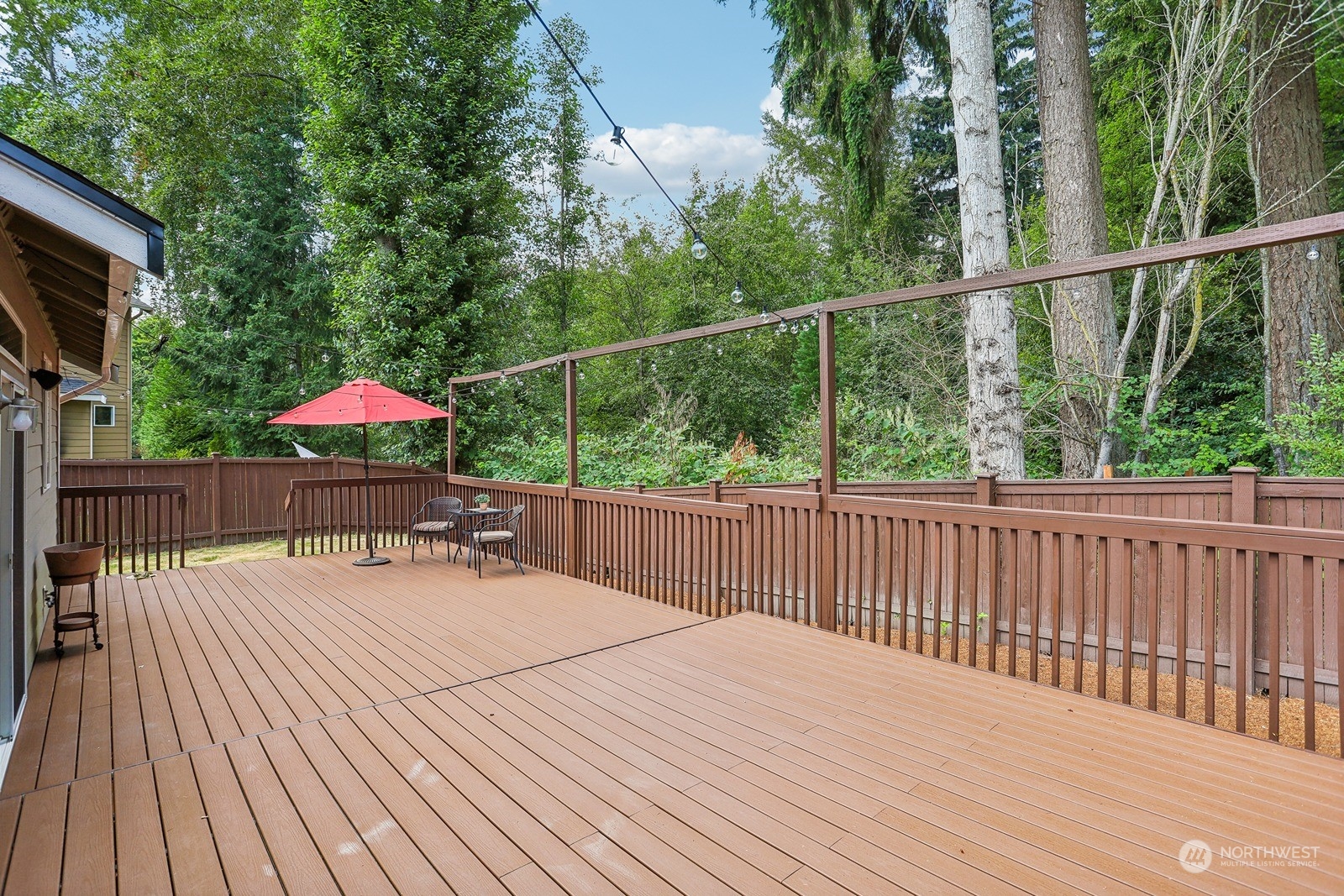 22712 30th Court Southeast Bothell, WA 98021 - Photo 33 of 38 a view of a wooden deck with furniture