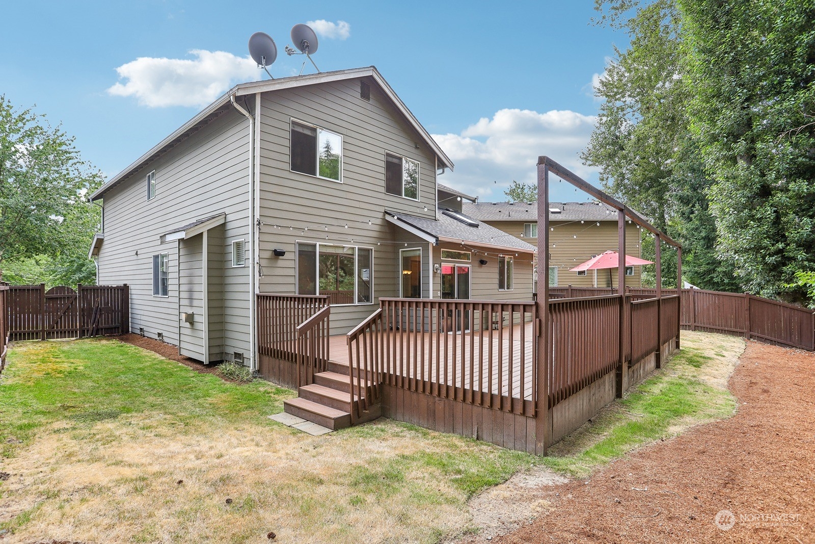 22712 30th Court Southeast Bothell, WA 98021 - Photo 36 of 38 a view of a house with a yard and deck