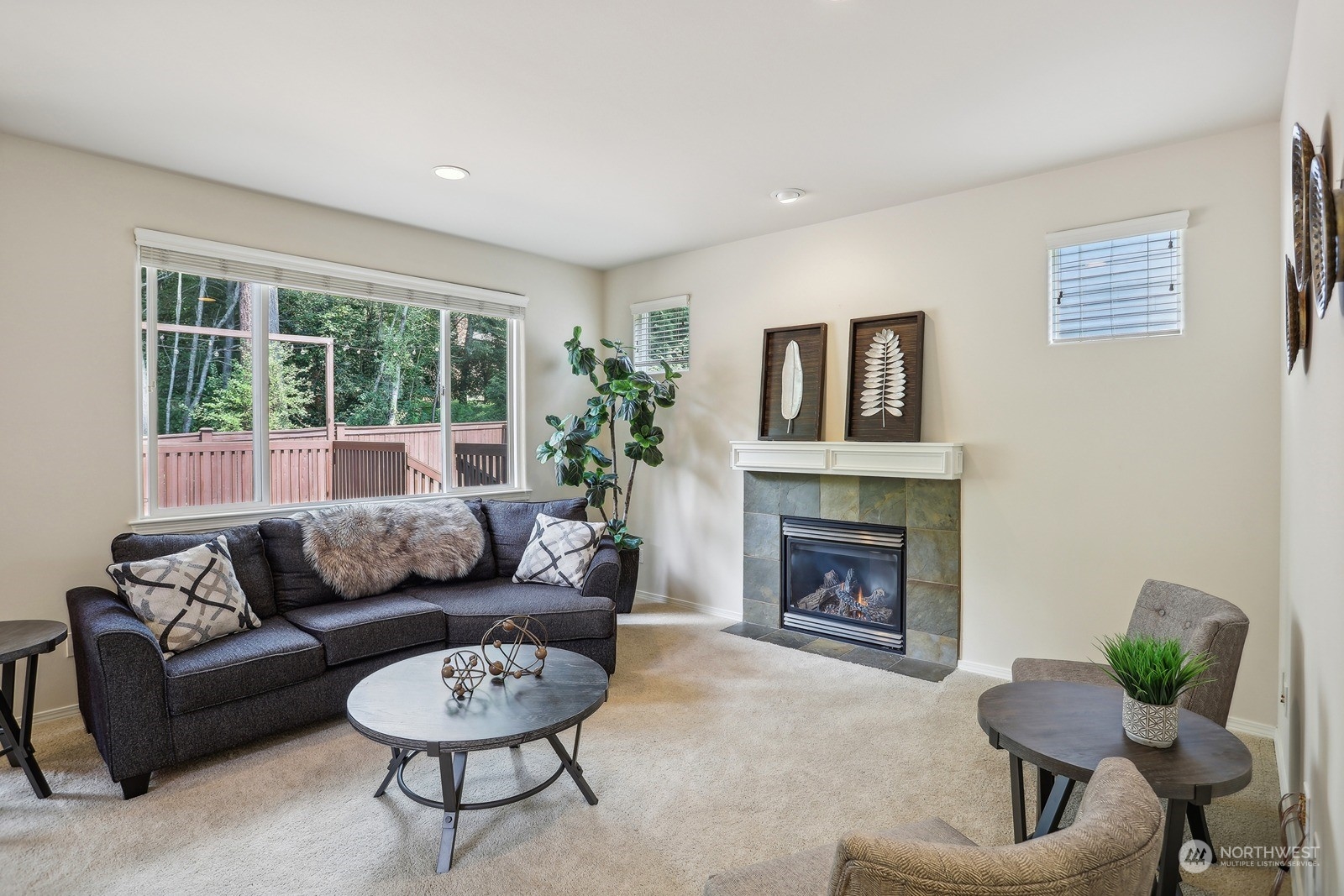 22712 30th Court Southeast Bothell, WA 98021 - Photo 4 of 38 a living room with furniture and a fireplace