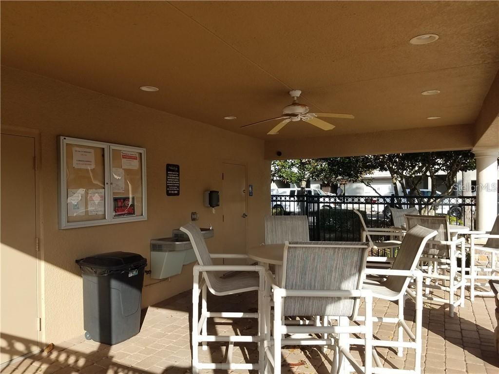 11919 Essington Street New Port Richey, FL 34654 - Photo 29 of 46 a view of a dining room with furniture