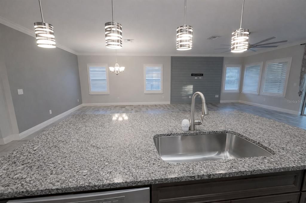 6204 Colmar Place Apollo Beach, FL 33572 - Photo 20 of 57 a bathroom with a sink a light fixture and a mirror