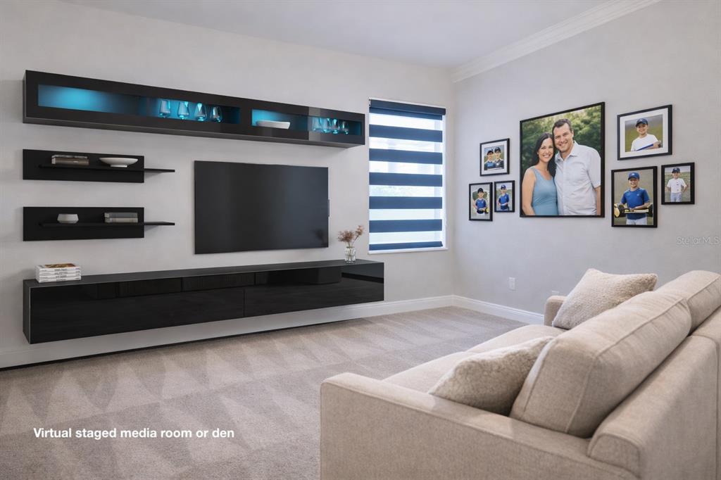 6204 Colmar Place Apollo Beach, FL 33572 - Photo 21 of 57 a living room with furniture and a flat screen tv