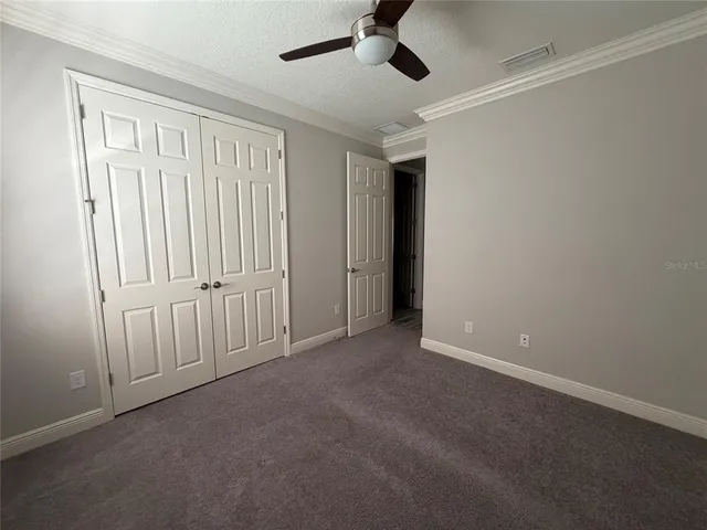 en empty room with windows