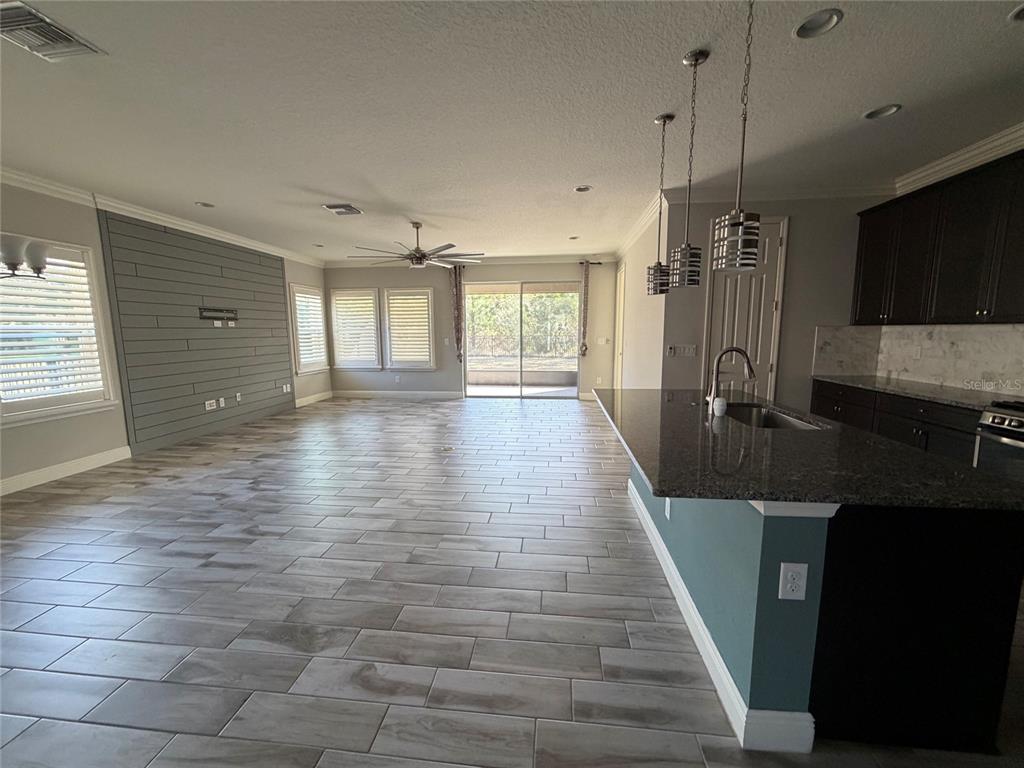 6204 Colmar Place Apollo Beach, FL 33572 - Photo 36 of 57 a view of a kitchen with a sink and a window