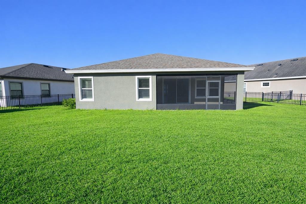 6204 Colmar Place Apollo Beach, FL 33572 - Photo 4 of 57 a front view of house with yard and green space