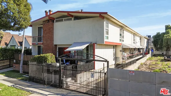 a front view of house with street