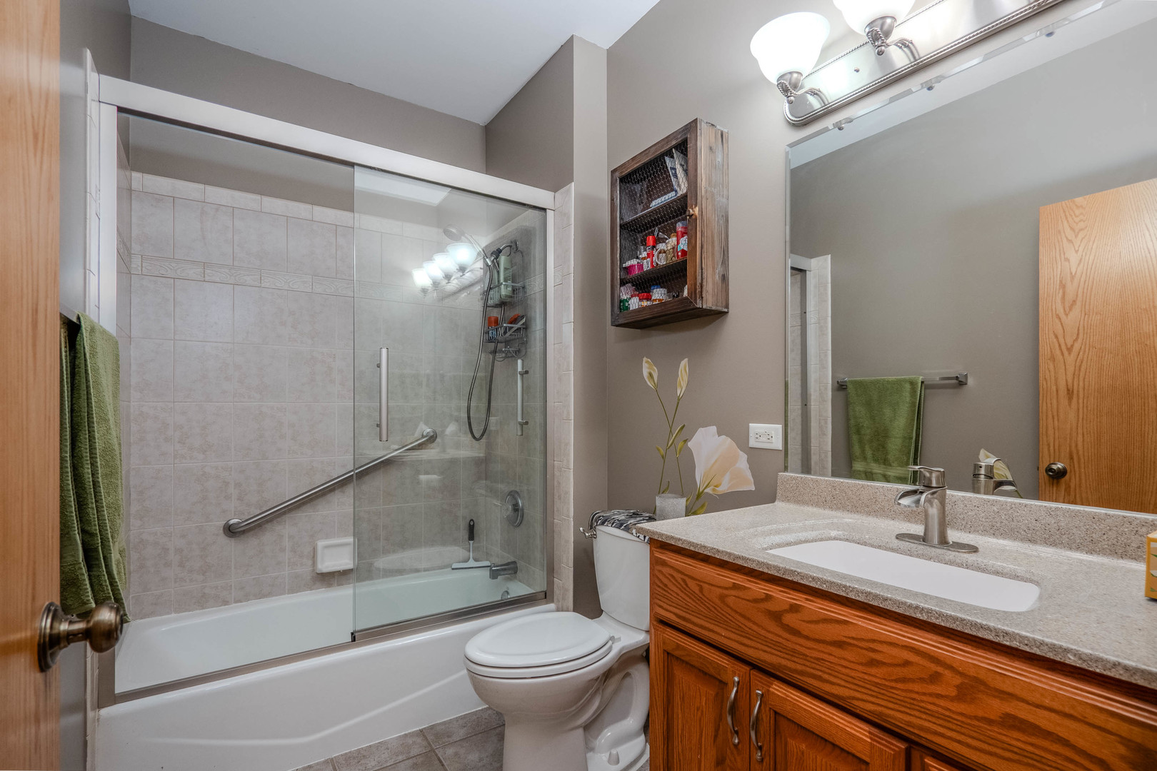 18808 Foxglove Lane Mokena, IL 60448 - Photo 12 of 26 a bathroom with a granite countertop sink toilet and shower