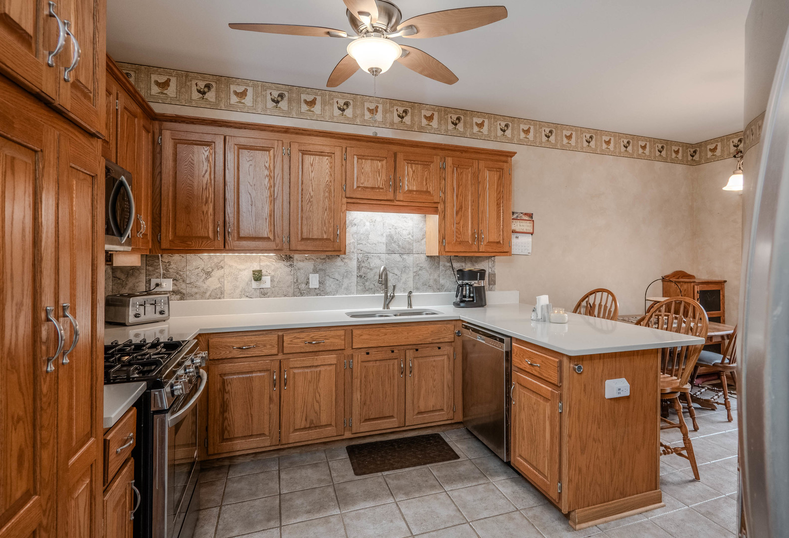18808 Foxglove Lane Mokena, IL 60448 - Photo 8 of 26 a kitchen with a sink appliances and cabinets