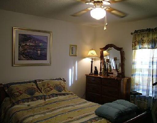 1618 Dugspur Road Callaway, VA 24067 - Photo 5 of 5 a bedroom with a bed and wooden floor