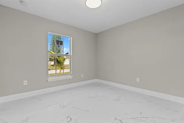 an empty room with window