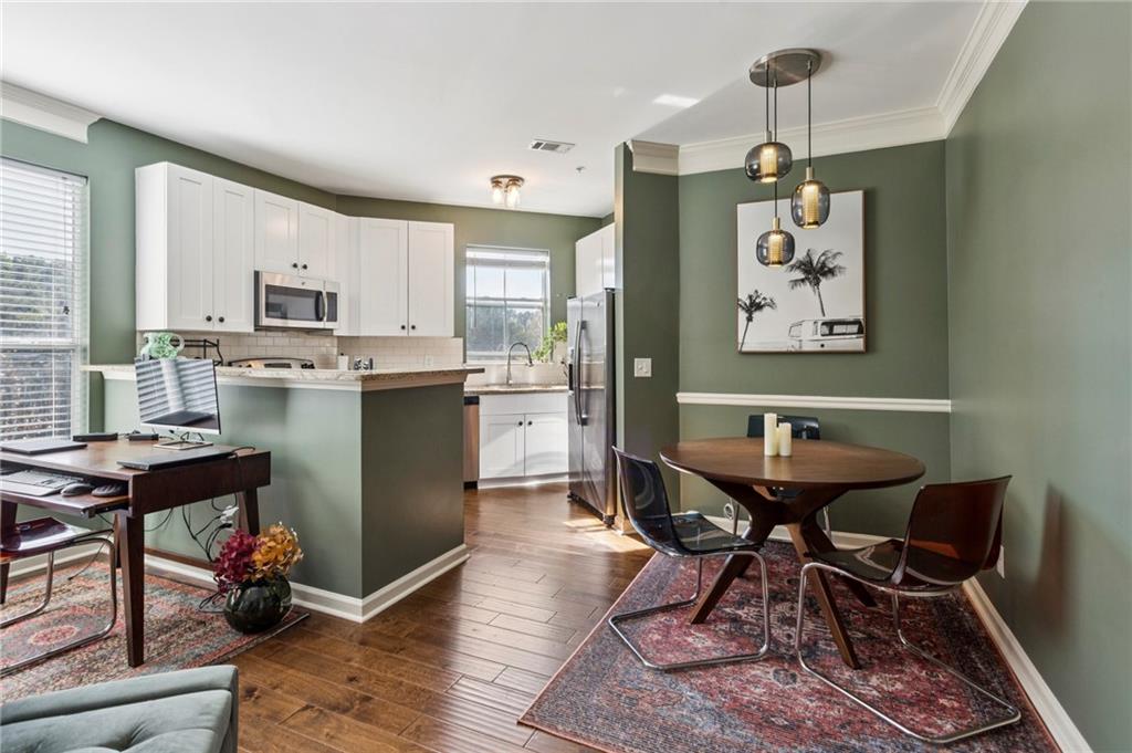 10 Perimeter Summit Boulevard, Unit 4337 Atlanta, GA 30319 - Photo 7 of 21 a dining room with furniture and window