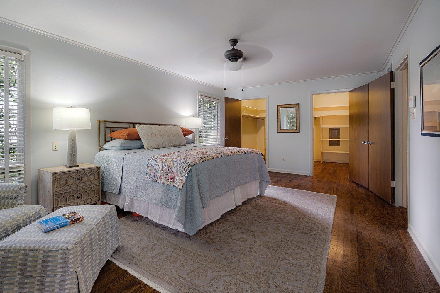 4317 Haverhill Road Memphis, TN 38111 - Photo 23 of 38 Bedroom featuring wood finished floors, crown molding, a walk in closet, and ceiling fan