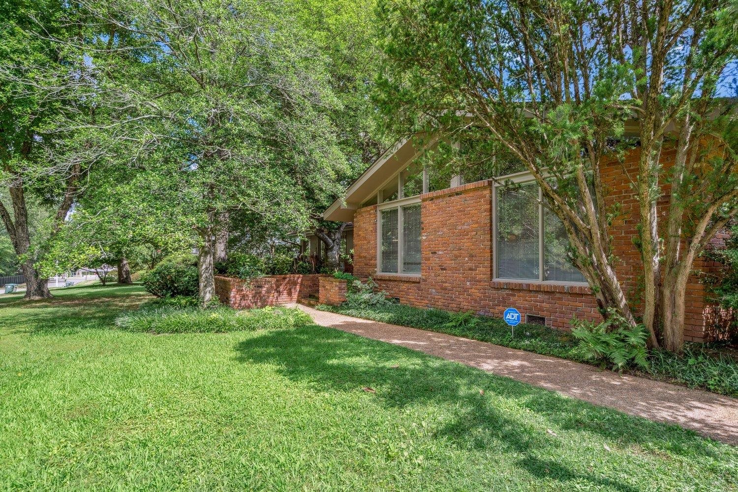 4317 Haverhill Road Memphis, TN 38111 - Photo 3 of 38 View of property exterior with brick siding and a lawn