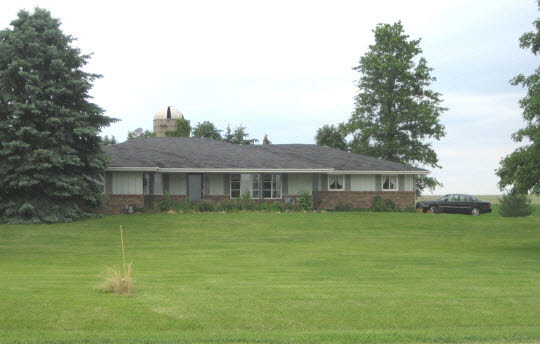 12782 Highway 64 Rochelle, IL 61068 - Photo 1 of 1 a view of a house with a big yard