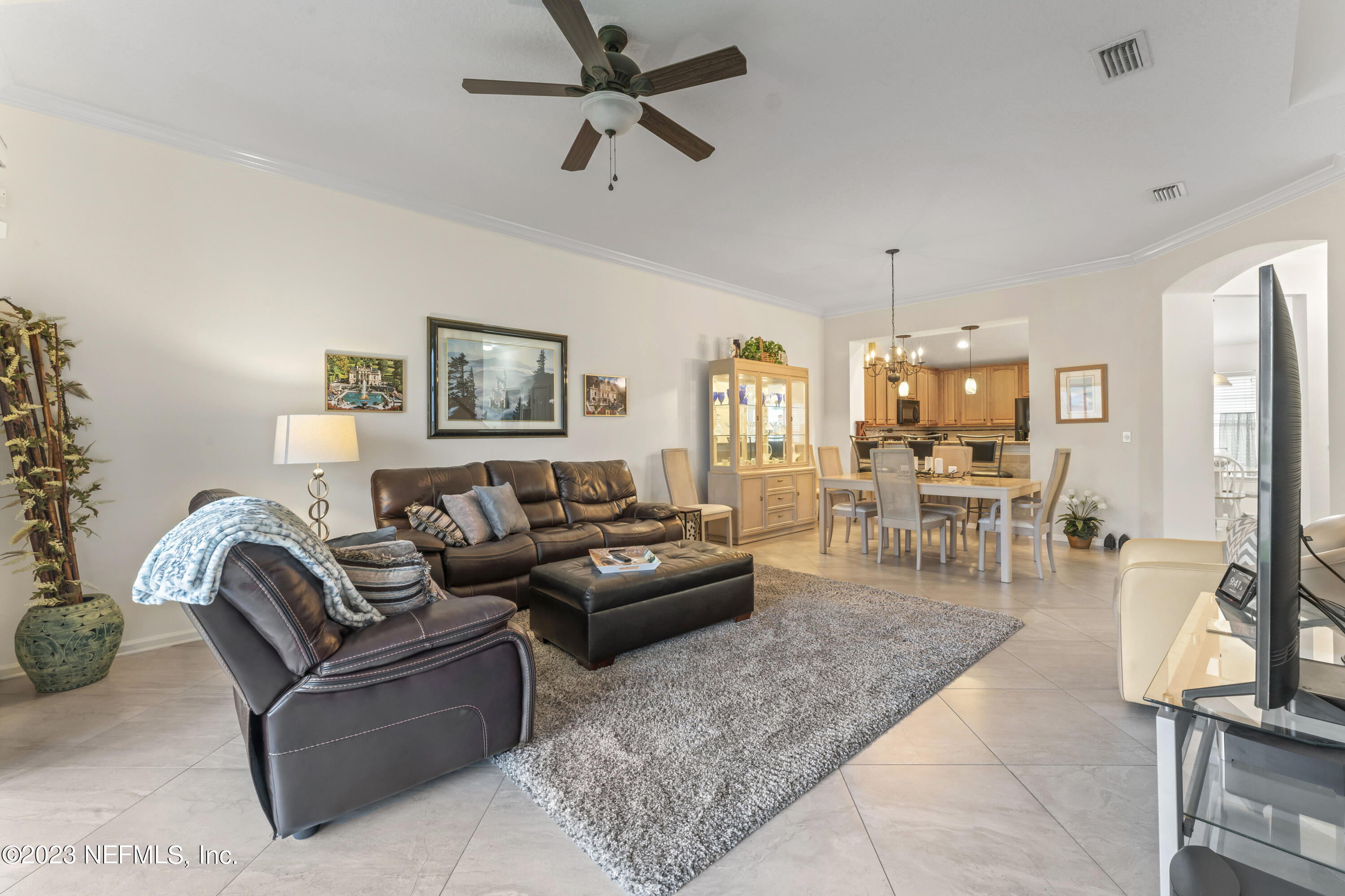 1840 Copper Stone Drive, Unit D Fleming Island, FL 32003 - Photo 16 of 66 a living room with furniture and a view of living room