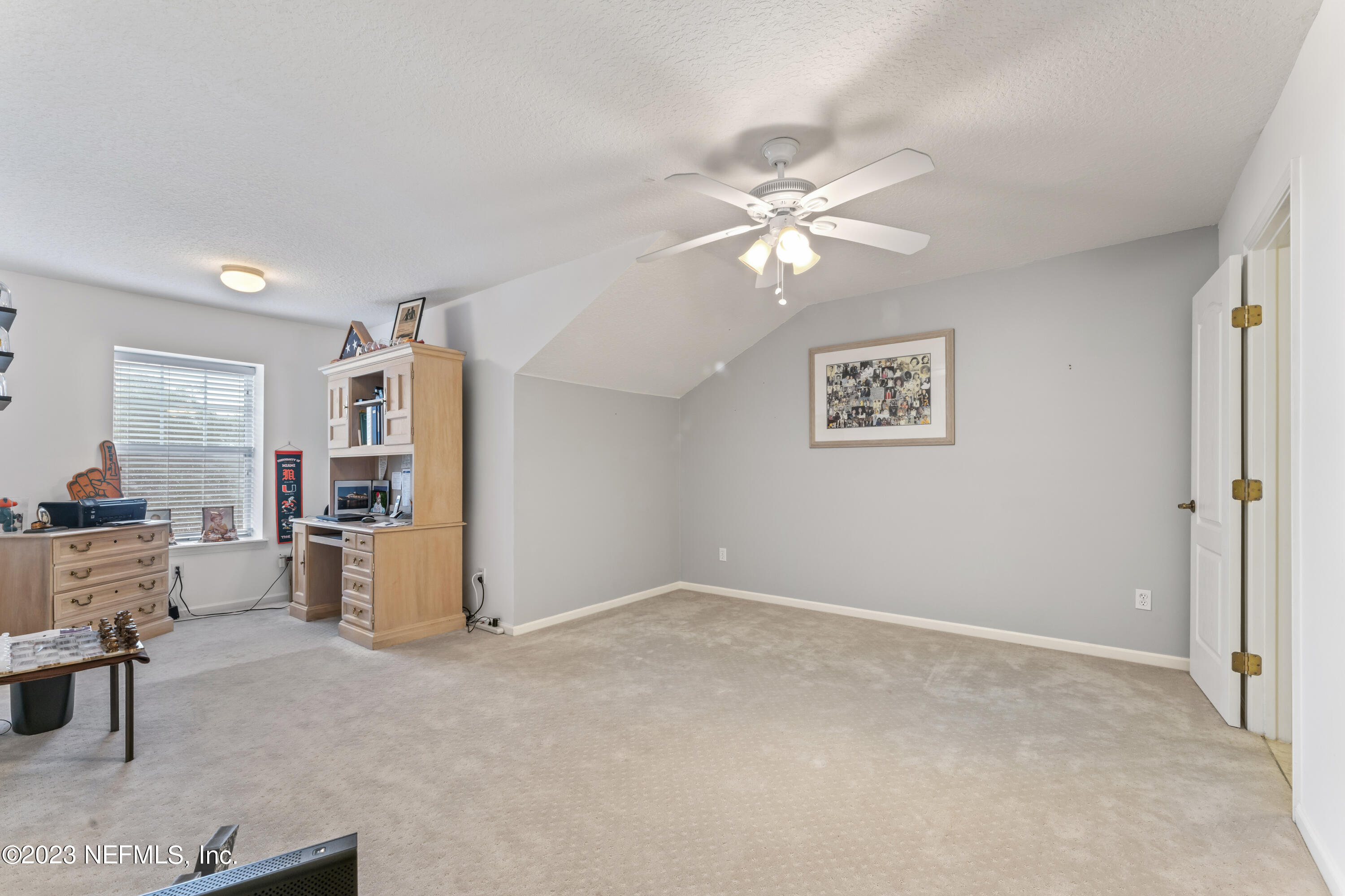 1840 Copper Stone Drive, Unit D Fleming Island, FL 32003 - Photo 30 of 66 a view of a workspace with furniture and workspace