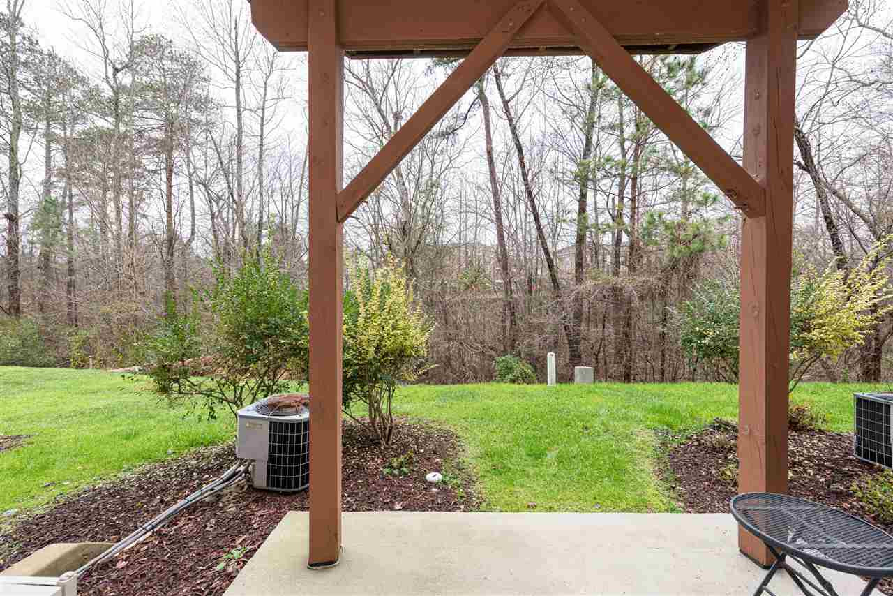 7749 Winners Edge Street Raleigh, NC 27617 - Photo 24 of 29 Patio off the lower level backs to wooded area for privacy. Back Patio