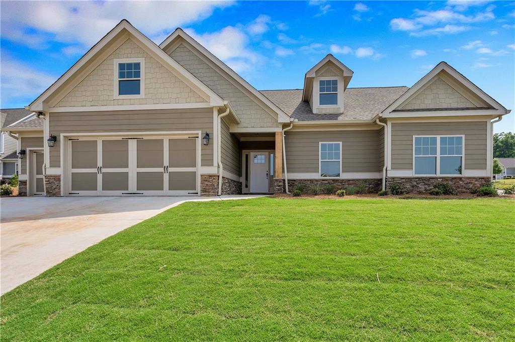 114 Cyn Rdg Trail Canton, GA 30114 - Photo 1 of 1 front view of a house with a yard