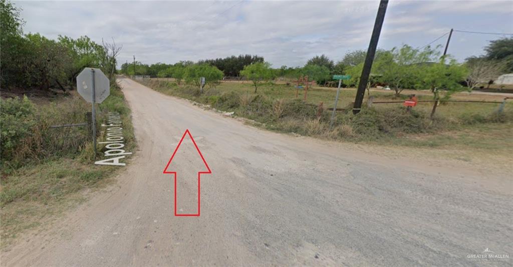 0 Riojas Road San Isidro, TX 78588 - Photo 13 of 16 a view of a field with tree in the background