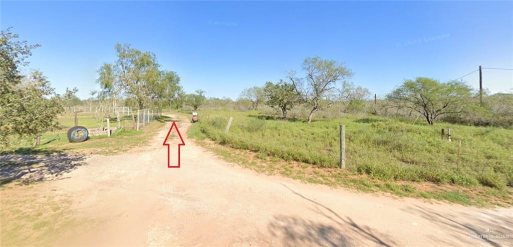 0 Riojas Road San Isidro, TX 78588 - Photo 15 of 16 a view of a yard with a tree