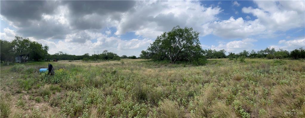 0 Riojas Road San Isidro, TX 78588 - Photo 6 of 16 a view of a garden with a lake