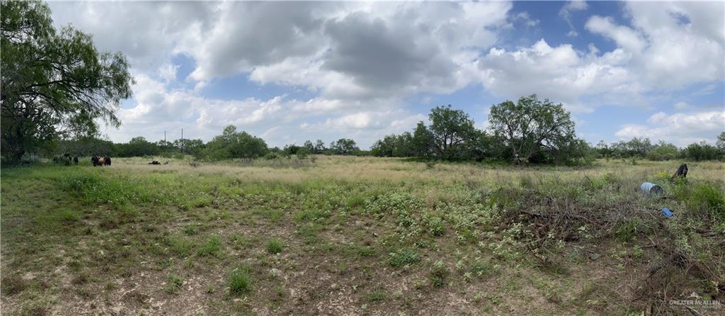 0 Riojas Road San Isidro, TX 78588 - Photo 10 of 16 a view of a lake with houses in the back